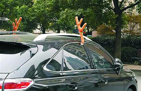 "鹿角车"上路貌似可爱实则违章